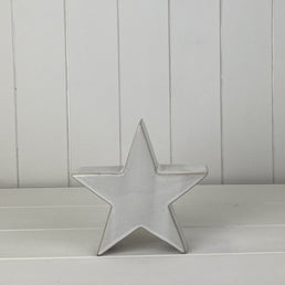 Glazed Ceramic Star Ornament With Textured Detail